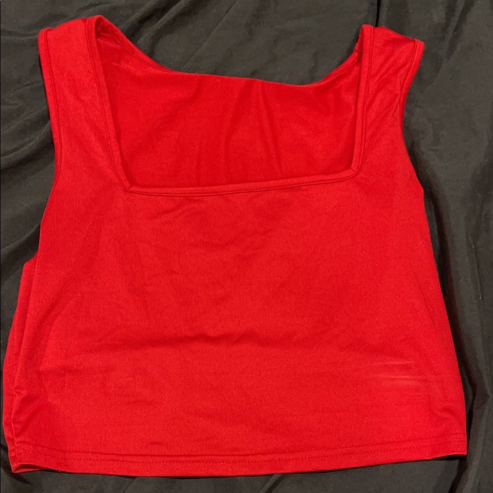 love this it is so cute red crop top. large fits like a medium too.